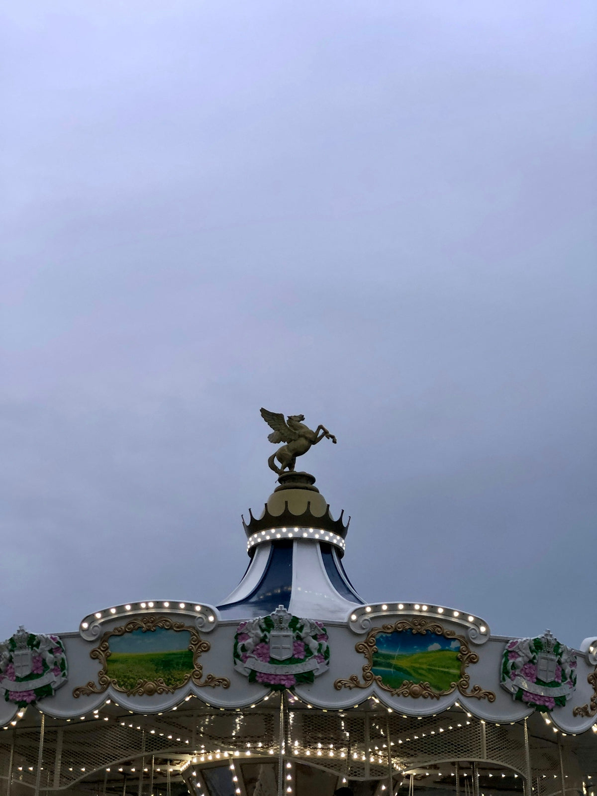 a merry go round on a cloudy day